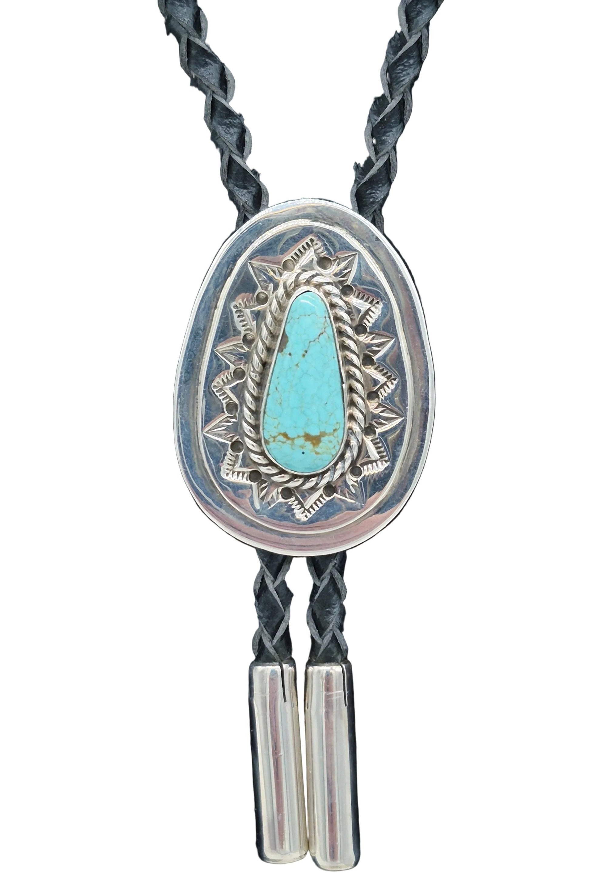 Navajo sterling silver bolo tie with turquoise cabochon and braided leather cord