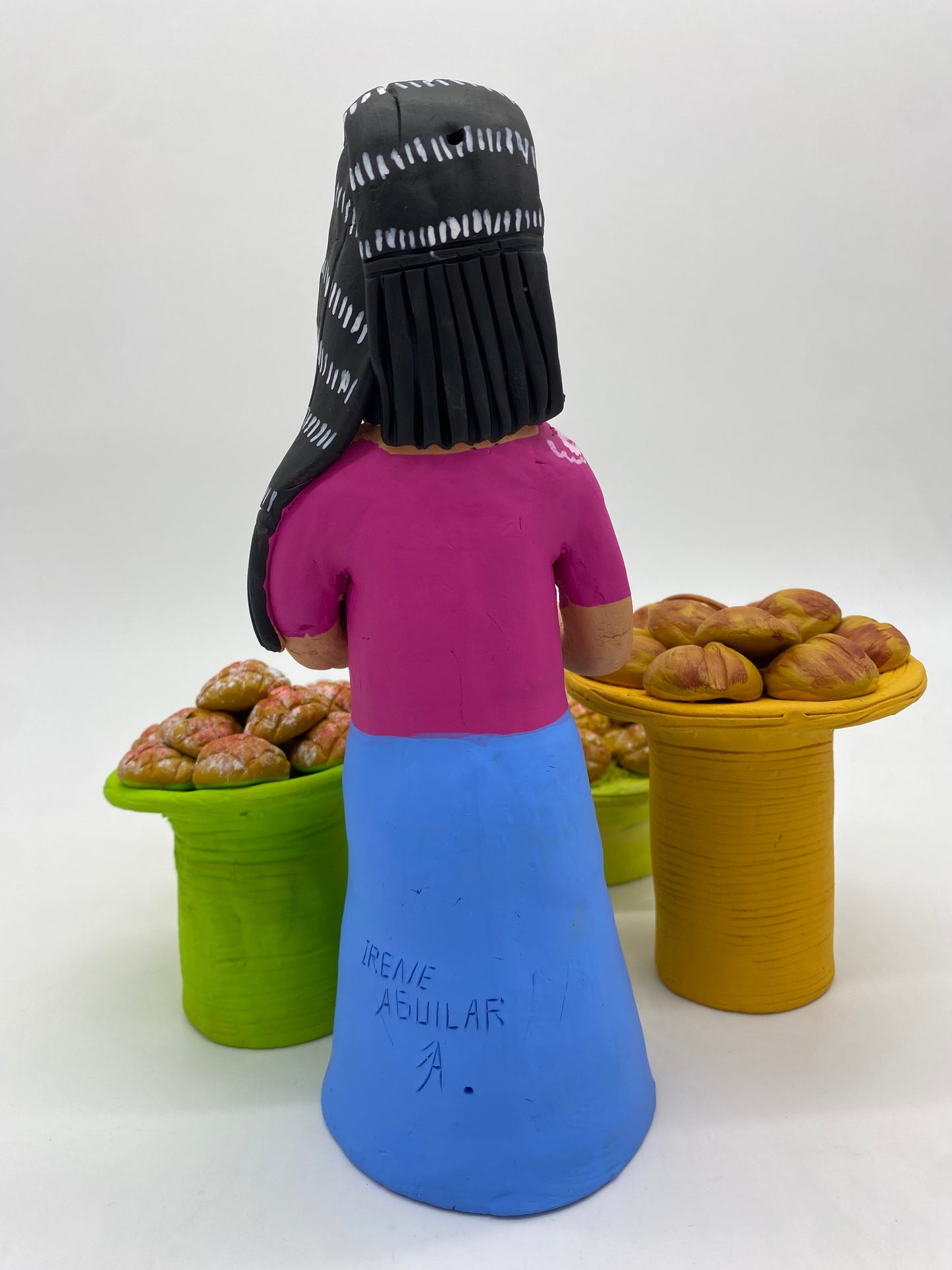 Irene Aguilar~ Woman With Bread Stand 9" x 3 1/2" x 4"