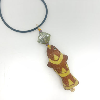 Lisa Smith ~ Ceramic Fish Pendant Necklace, reversible 3 1/4" x 1" x 1/4"