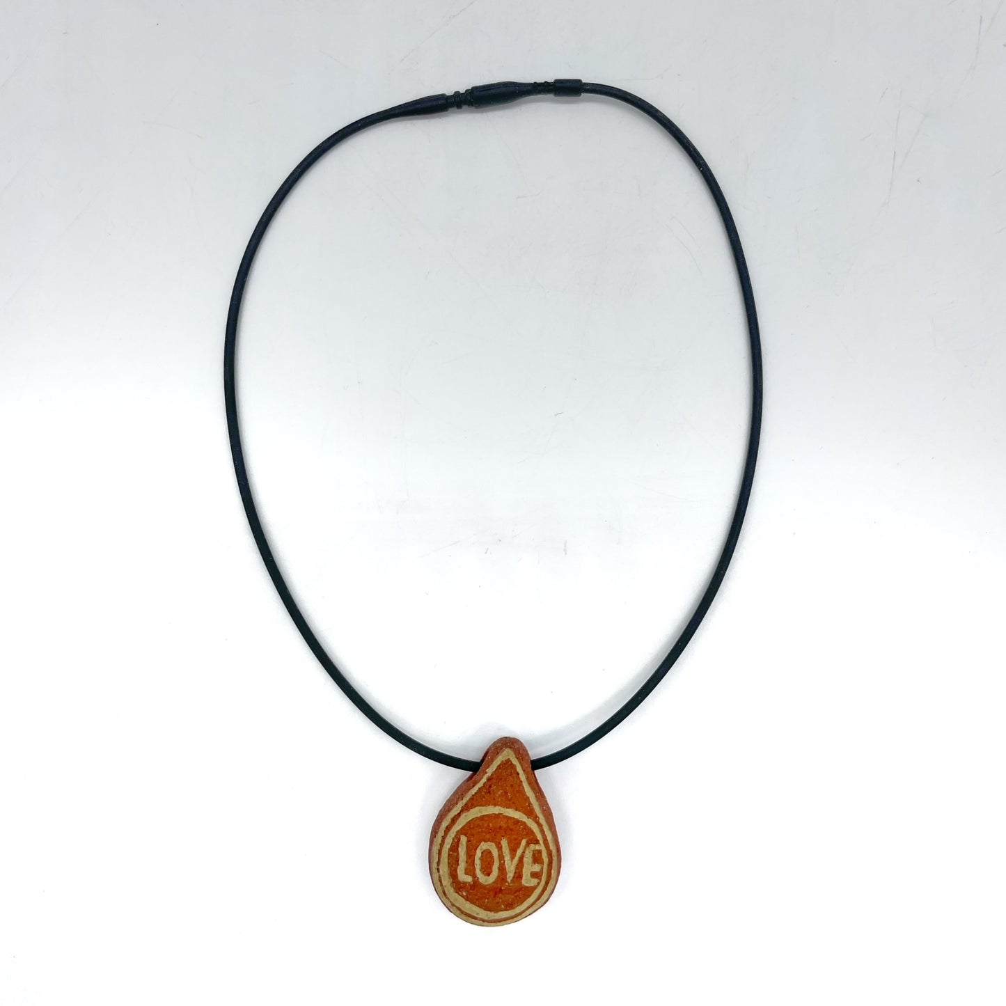 Lisa Smith ~ Ceramic "Love / Heart" Pendant Necklace, reversible 1 1/2" x 1" x 1/2" on 16"