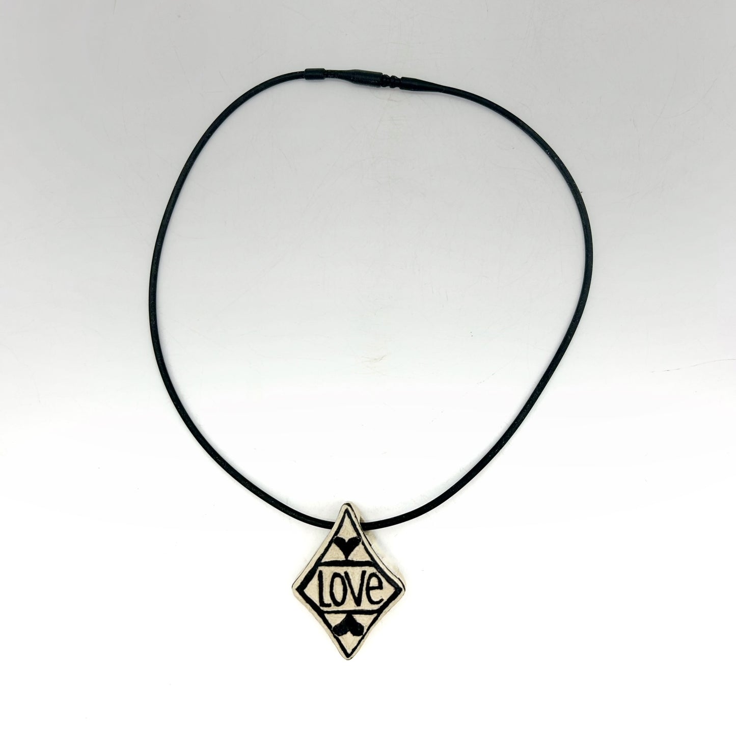 Lisa Smith ~ Ceramic "Love / Plant" Pendant Necklace, reversible 1 3/4" x 1 1/4" x 1/2" on 16"
