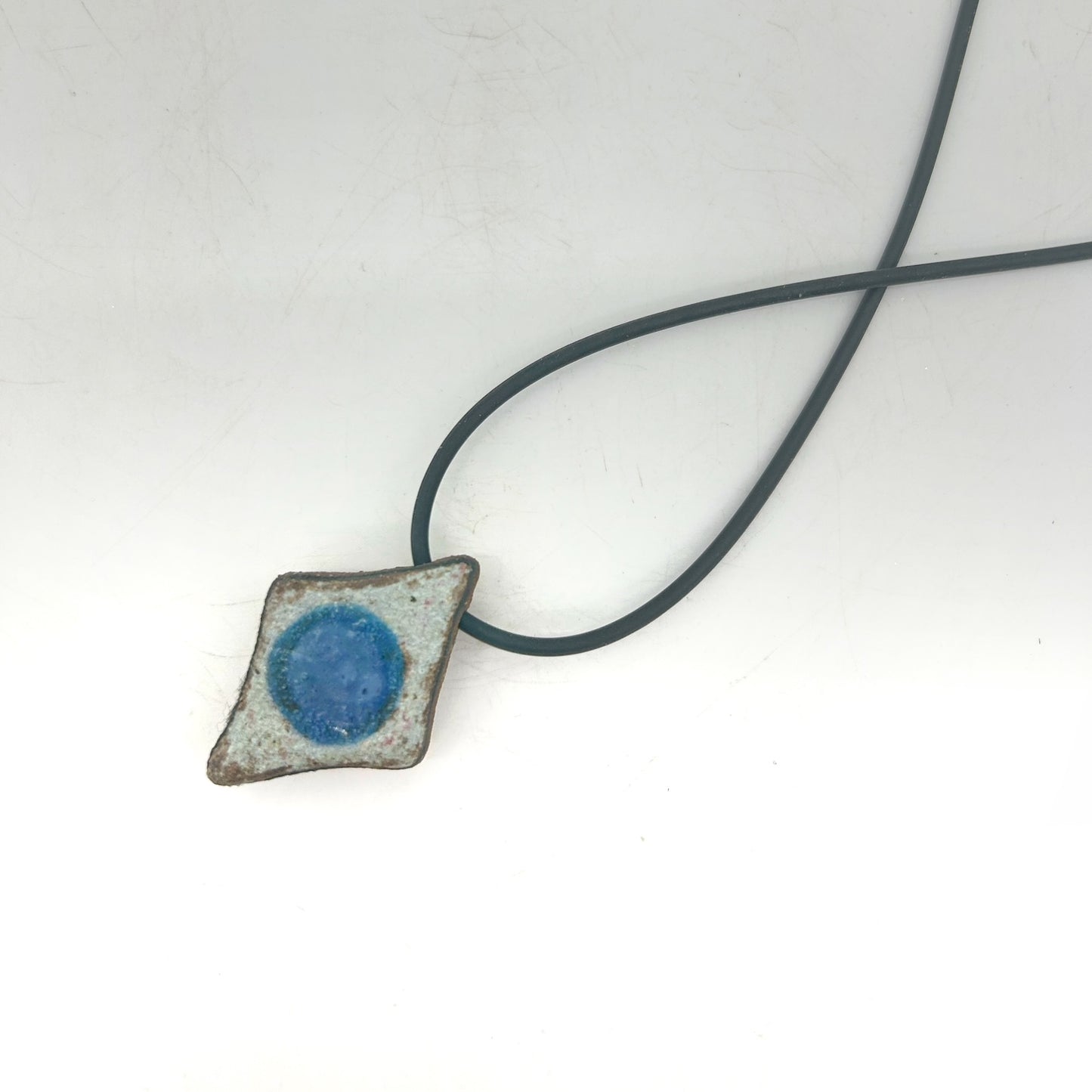 Lisa Smith ~ Ceramic Red Dot Pendant Necklace, reversible 1 1/4" x 1" x 1/2" on 16"