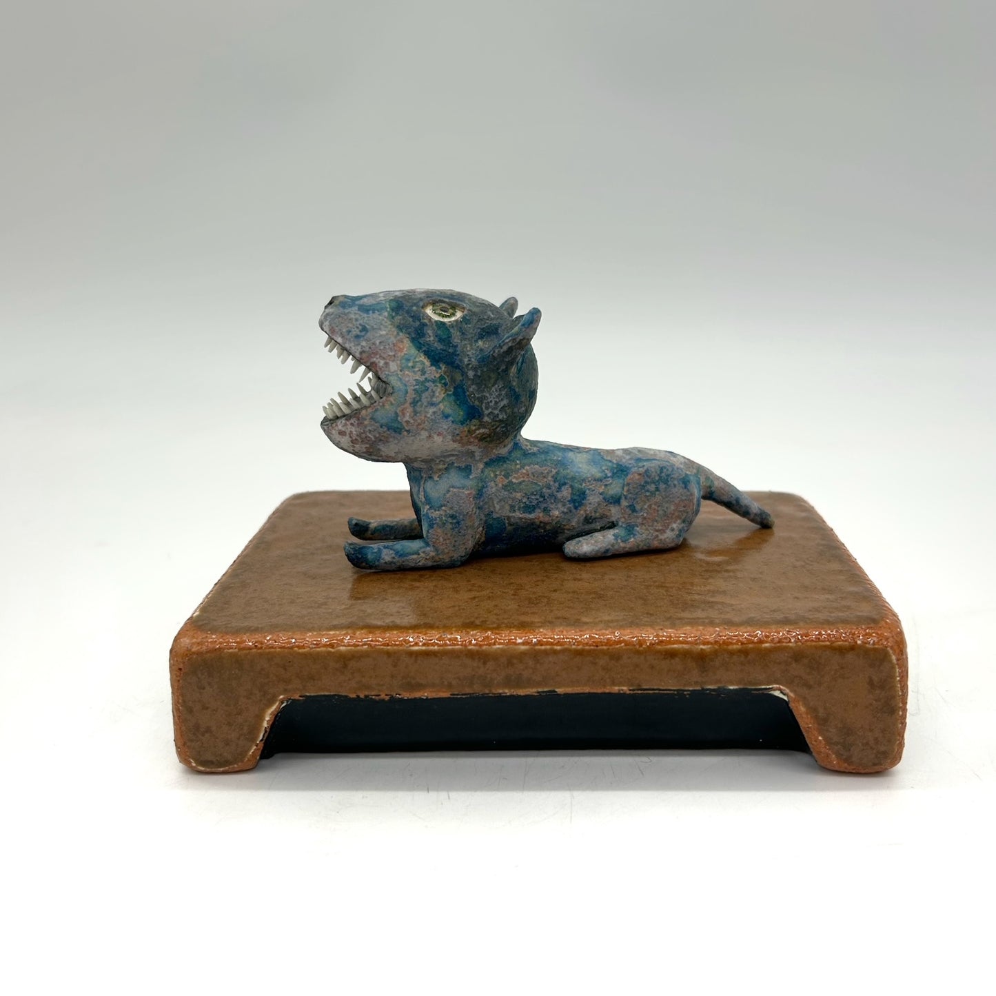 Wesley Anderegg ~ "Blue Dog Lying Down" ceramic, 3 3/4" x 6" x 4"